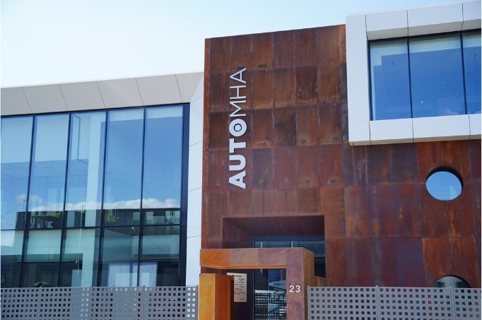 front facade image of new automha warehouse headquarters